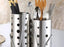 رفايع المطبخ  طقم ٣ قطع مصفاة ملاعق و سكاكين دائرية (٢ مصفاة+حامل) ستانليس ستيل فضي - DV-111  Ahmed Samir